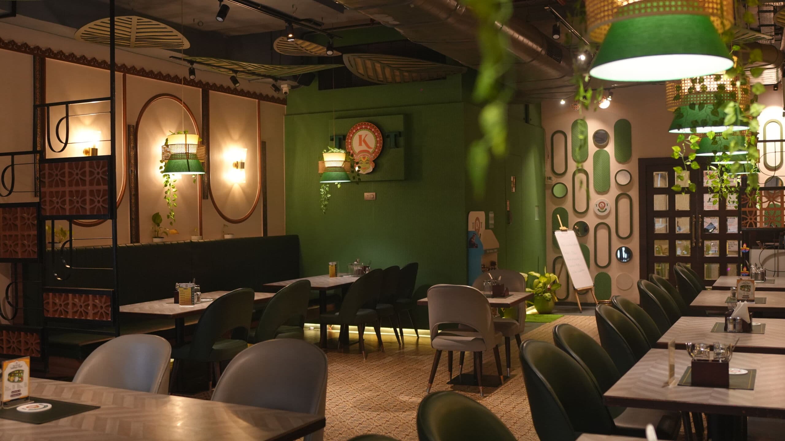The Kerala Table dining room — warm, atmospheric interior